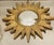 Vintage convex sunburst gold mirror. 12”