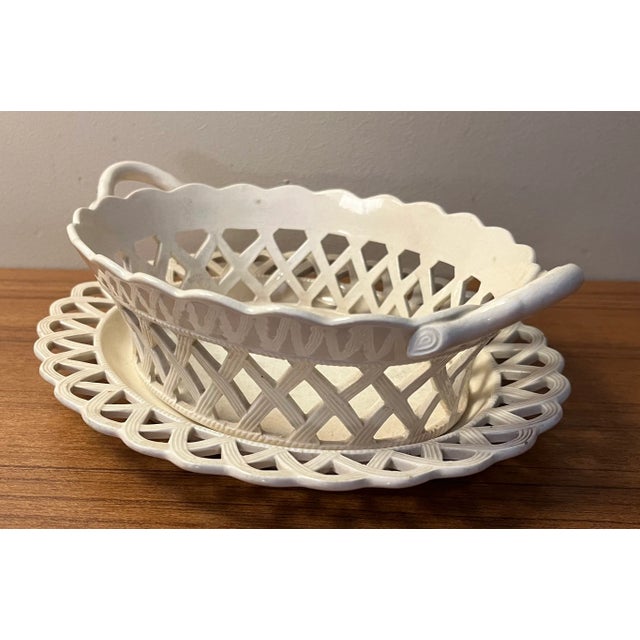 Antique 18th century George III creamware chestnut basket and under tray. Wonderful reticulated basketweave design with...