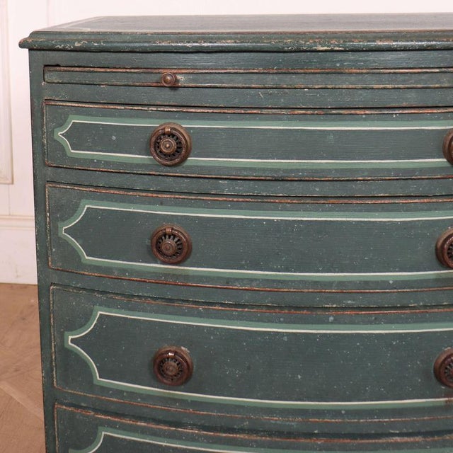 Small late 19th century English bowfront bedside chest of drawers. Circa 1890. This piece is designed in the style of the...