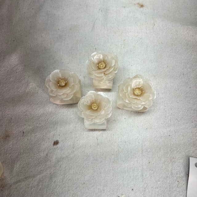 Ring measures 1.5” diameter. Standing height with flower is 2.75”.