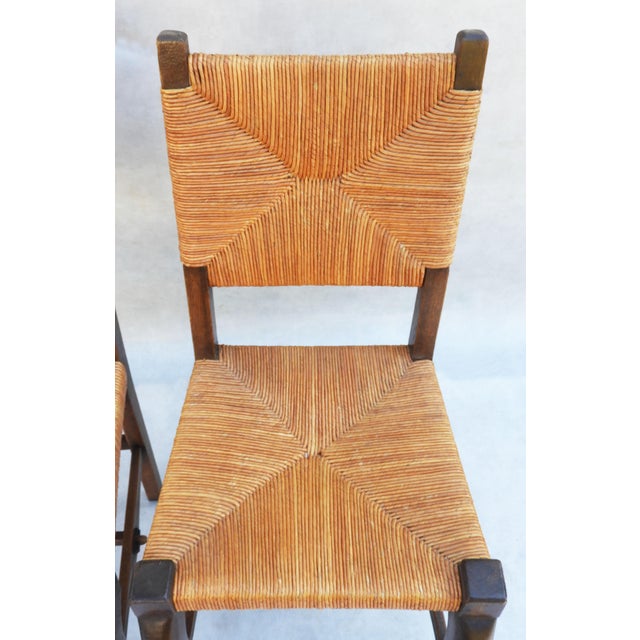 Charming Pair of Provincial French oak and rush back and chairs C1920. All original carved oak frames, with cabriolet...