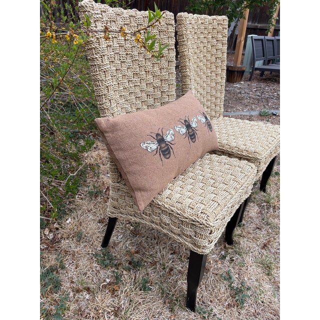 Bring rich natural texture and sculptural style to your dining room with this striking pair of handwoven seagrass dining...