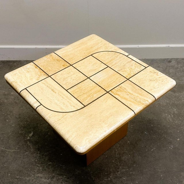 A beautifully executed 1970s coffee table showcasing a sculptural, architectural presence, this piece combines a luxurious...