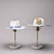 Pair of table lamps made in Italy in the 1970s. Each lamp rests on a circular white marble base surmounted by a gilt brass...