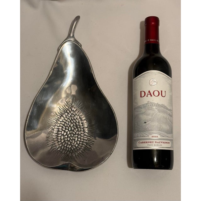 This authentic 1992 Mariposa Brillante pear-shaped serving dish beautifully merges organic form with striking mid-century...