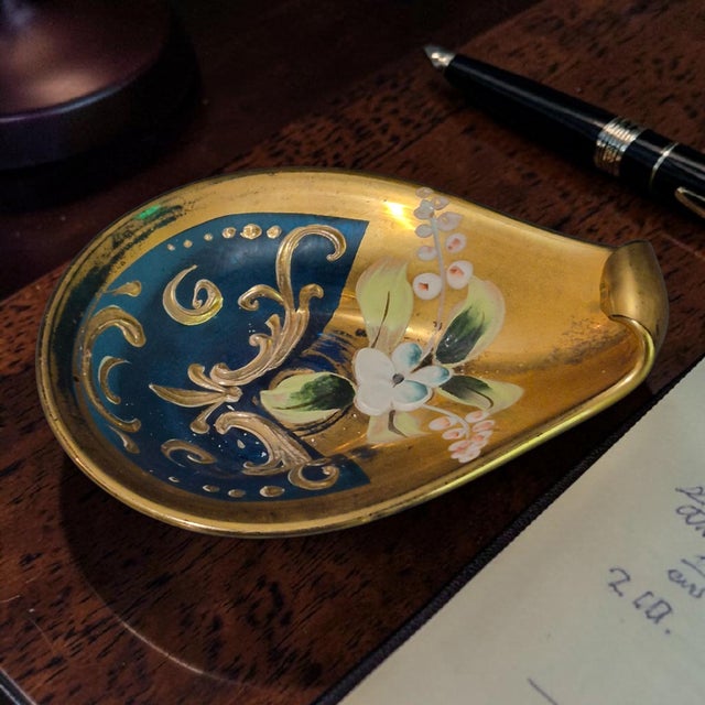 This vintage Bohemian art glass trinket holder features intricate hand-painted enamel floral designs in a multi-color...