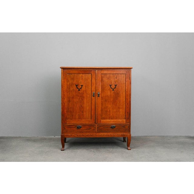 Item: Half-height cabinet Period & Style: Art Nouveau - Early 20th century Features: - Elegant and practical piece of...