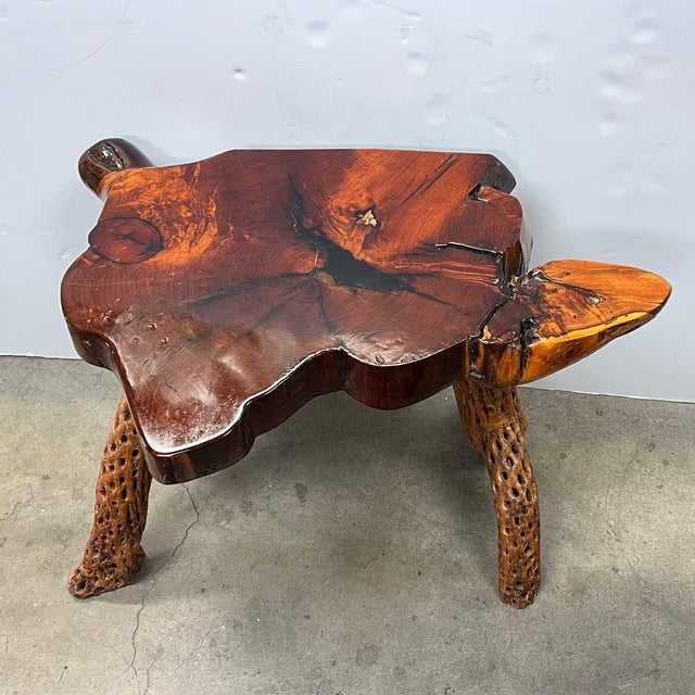 This organic, turtle sculptural table features a thick slab of redwood burl with a highly polished top and dramatically...