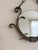 An exceptional vintage wall mirror crafted in the distinctive manner of the legendary French master metalsmith Raymond...