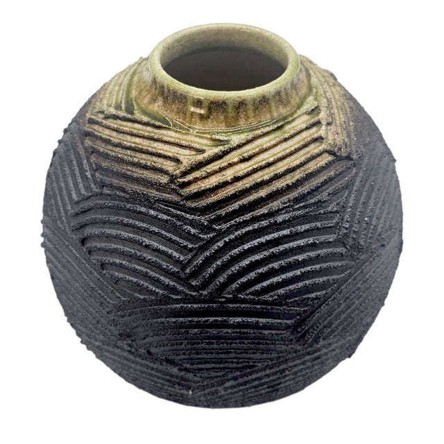 A substantial late twentieth-century Japanese stoneware vase identified as Shigaraki production ware, dating to circa...