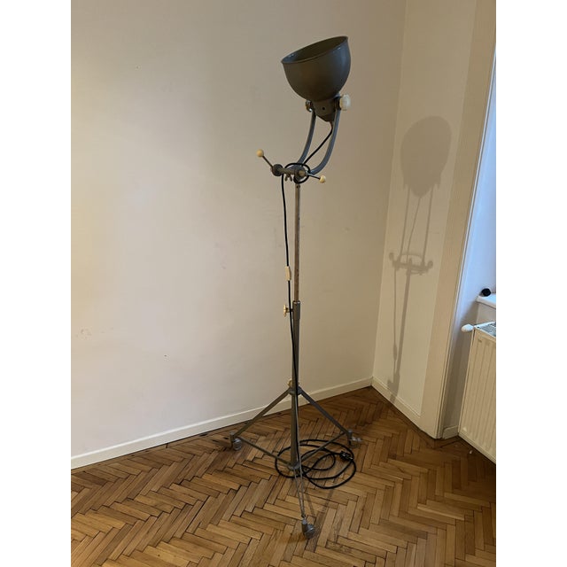 This vintage Bundeswehr floor lamp is a striking piece of utilitarian German industrial design from the 1960s–1970s....