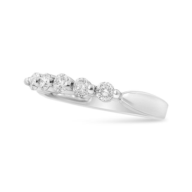 Timelessly designed, this petite and elegant ring is set with 5 natural diamonds in a unique pave setting. The diamonds...
