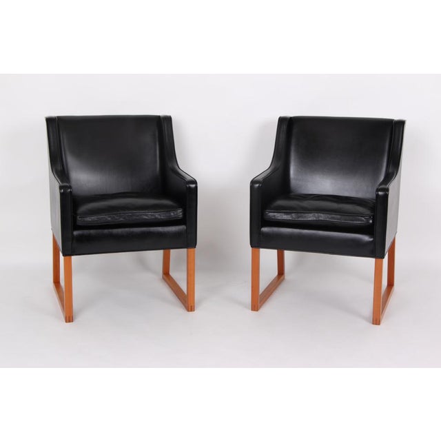 Beautiful and comfortable armchairs with a frame made of cherry wood, padded with original black quality leather. The...