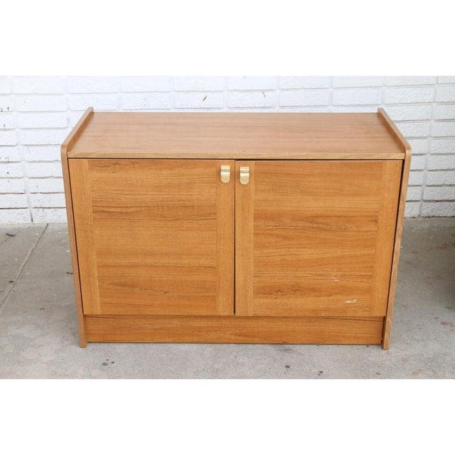Danish Modern Teak Record Media credenza Features a pull out shelf for cassettes, compartment for records, and shelving....