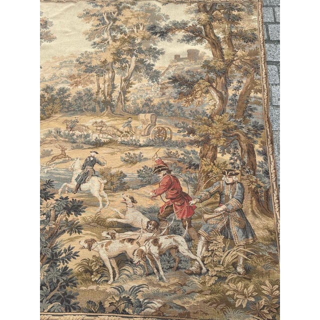 "Discover the timeless elegance of this exquisite vintage French tapestry featuring a hunting with hounds scene. A noble...