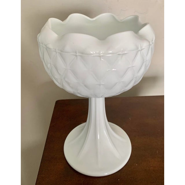 Standing 9” tall and 7”diameter this vintage oversized milk glass bowl is perfect to serve at a breakfast buffet, a candy...
