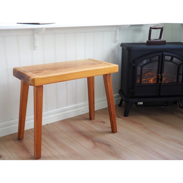 A rustic pine stool with a Scandinavian handcrafted feel. This charming stool in solid wood construction radiates...
