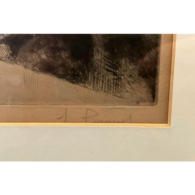 Signed, matted, and framed antique etching "La Femme au Chien" by French artist Auguste Brouet. Numbered "61/100". Set in...