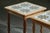 A pair of Danish oak side tables from the 1970s, equally suited as bedside tables or compact occasional tables. Their slim...
