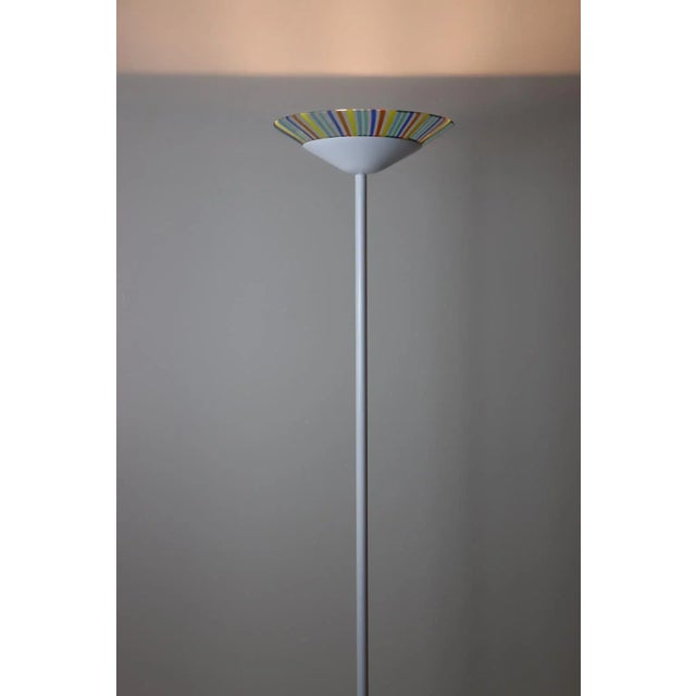 Mid Century Modern Floor Lamp, White Lacquered Metal Stem and Murano Multicolor Glass Diffuser. The "Alo" floor lamp was...