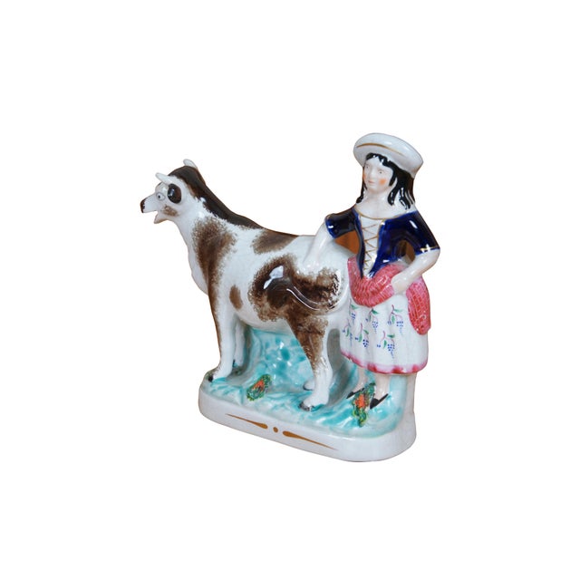 Antique 19th century Staffordshire porcelain flatback figural spill vase or creamer in the shape of a woman with grapes on...