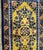 A striking handmade vintage Chinese Art Deco silk rug from the 1950s, distinguished by its luminous golden-yellow field...