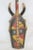 Stunning Large polychromed mask- Yellow, red, beige, black-primitive in nature with an aesthetic befitting a power space....