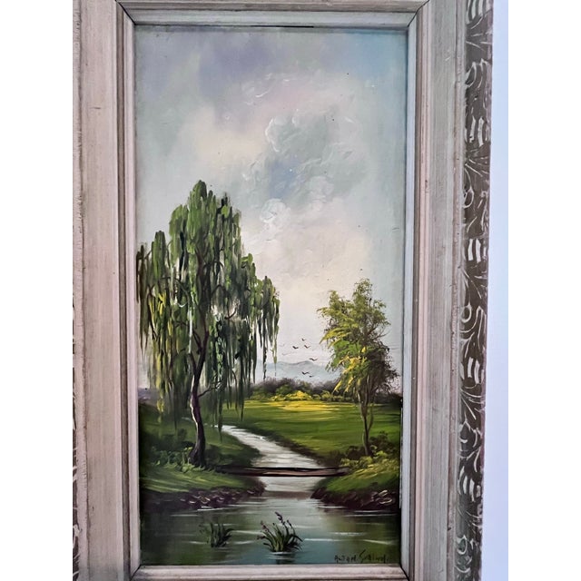 A charming vintage landscape oil painting depicting a peaceful countryside scene with a meandering stream, willow tree,...