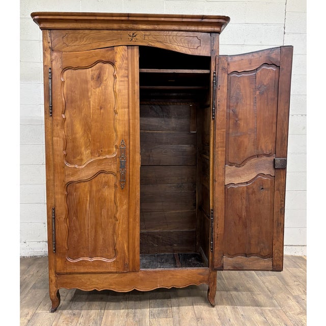 This is an absolutely gorgeous, stunning, and rare antique 19th century French Provincial Louis XV style carved armoire...