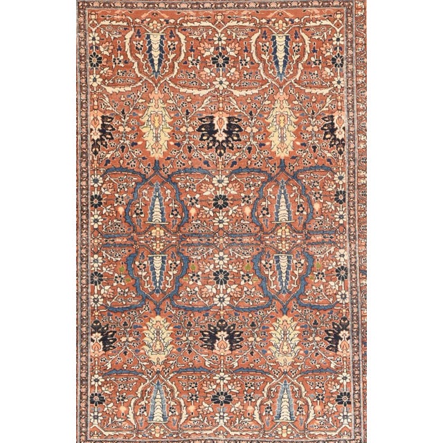 The very desirable copper-rust field supports a bilaterally symmetric design of cypresses, ragged and petal palmettes,...