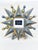 Add a touch of dramatic, celestial charm to your tabletop or gallery wall with this striking starburst photo frame by...