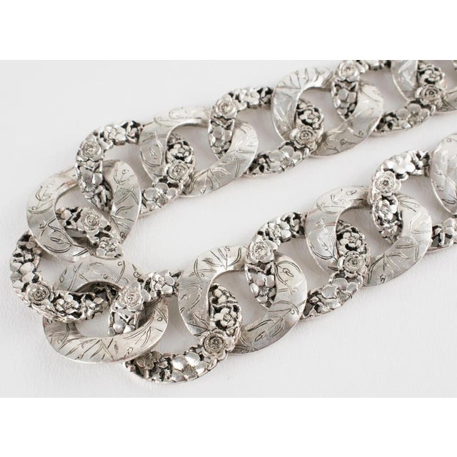 This stunning Kenzo Paris choker necklace features an around-the-neck, large, flat chain shape in silver-plated metal, all...