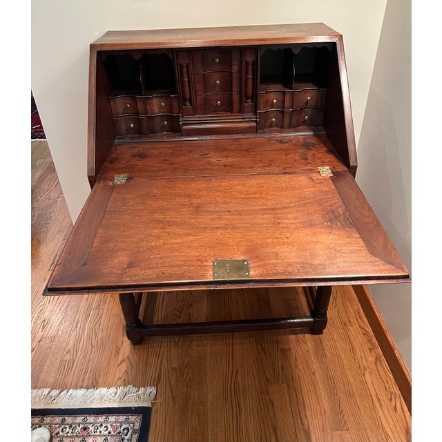 Professionally appraised in 2021 at $8,000, this small walnut desk features a unique form, where the primary desk section...