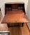 Professionally appraised in 2021 at $8,000, this small walnut desk features a unique form, where the primary desk section...