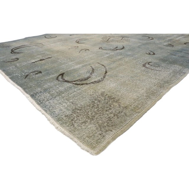 Distressed Vintage Turkish Sivas Rug 07'05 X 10'02. With its simplicity and Zeki Muren style, this hand-knotted wool...