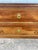 Elegant 19th-century French Louis XVI commode crafted in walnut with a white marble top. Featuring two spacious drawers,...