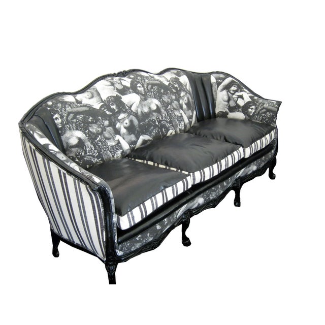 Not your Grandmas sofa!!! This one of a kind turn of the century Victorian sofa frame has been updated by Sultanchic and...