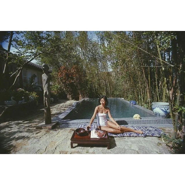 Cecily Godfrey 1979 by Slim Aarons Slim Aarons Limited Estate Edition Cecily Godfrey relaxes by the pool at her home in...