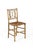 A charming faux bamboo georgian painted side chair with a rattan seat. The chair exhibits a double rail to the top with...