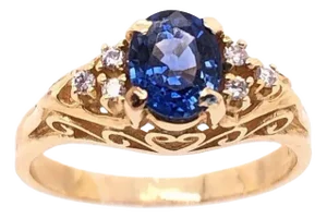 14 Karat Yellow Gold Sapphire Solitaire Ring With Side Diamond Accents