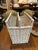 Vintage white washed natural wicker divided magazine holder.