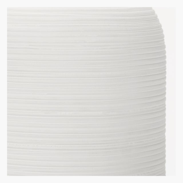 Clean lines and elemental materials lend an iconic quality to the Fanny table lamp by Hable. This petite accent size...