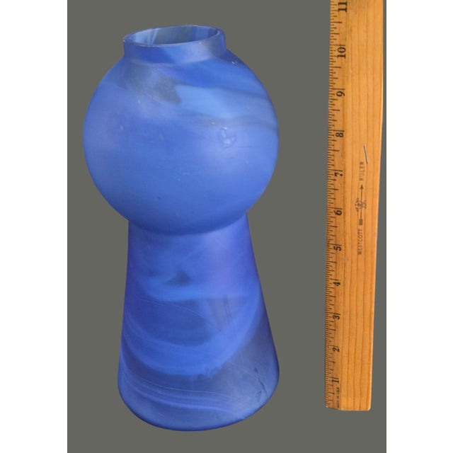 The Mid-Century Modern Italian Art Glass Blue Swirl Unusual Shape Vase by Art Glass is a vintage piece of decorative...