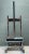 This vintage rustic wood artist easel captures the authentic character of a well-loved studio essential, its robust wood...