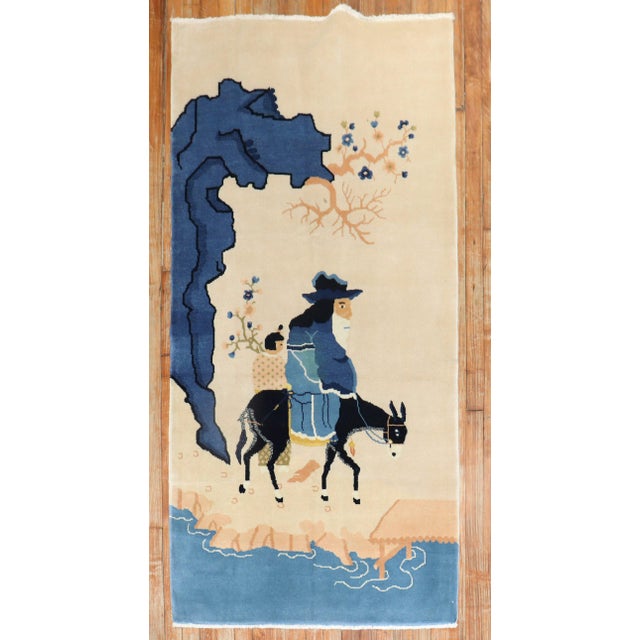 One of a kind Late 20th century Chinese rug with a shepherd riding on a mule. Measures: 3'1'' x 6'1''.
