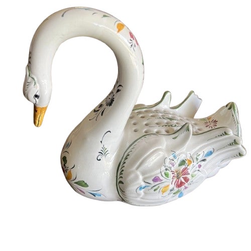A charming vintage ceramic swan vase featuring a hand-painted finish and integrated flower frog design. Crafted in...