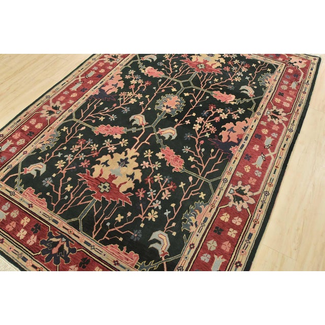 An authentic vintage traditional Heriz rug hand-knotted with fine wool on a cotton foundation. This rug features a...