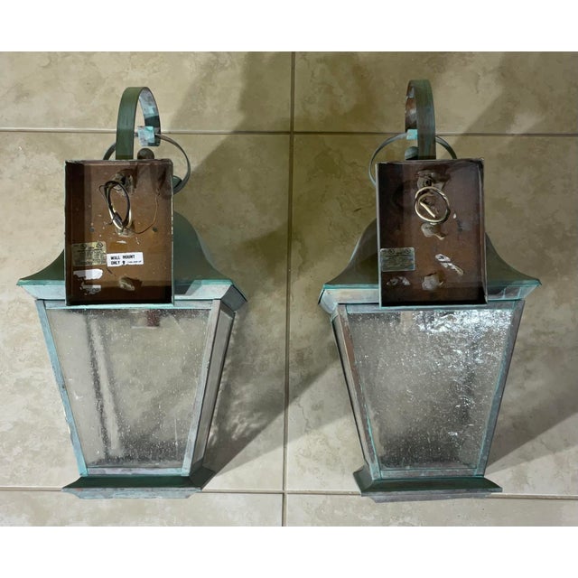 pair of vintage solid brass lanterns exudes timeless elegance and old-world charm. Crafted from , high-quality solid...