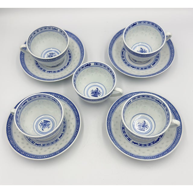 Elevate your table setting with the elegant Rice Flower series by Jingdezhen, a testament to fine Chinese craftsmanship....