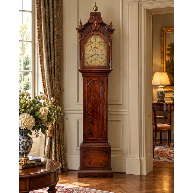 An exceptional antique Georgian mahogany longcase grandfather clock by John Taylor of London, dating to circa 1780. This...